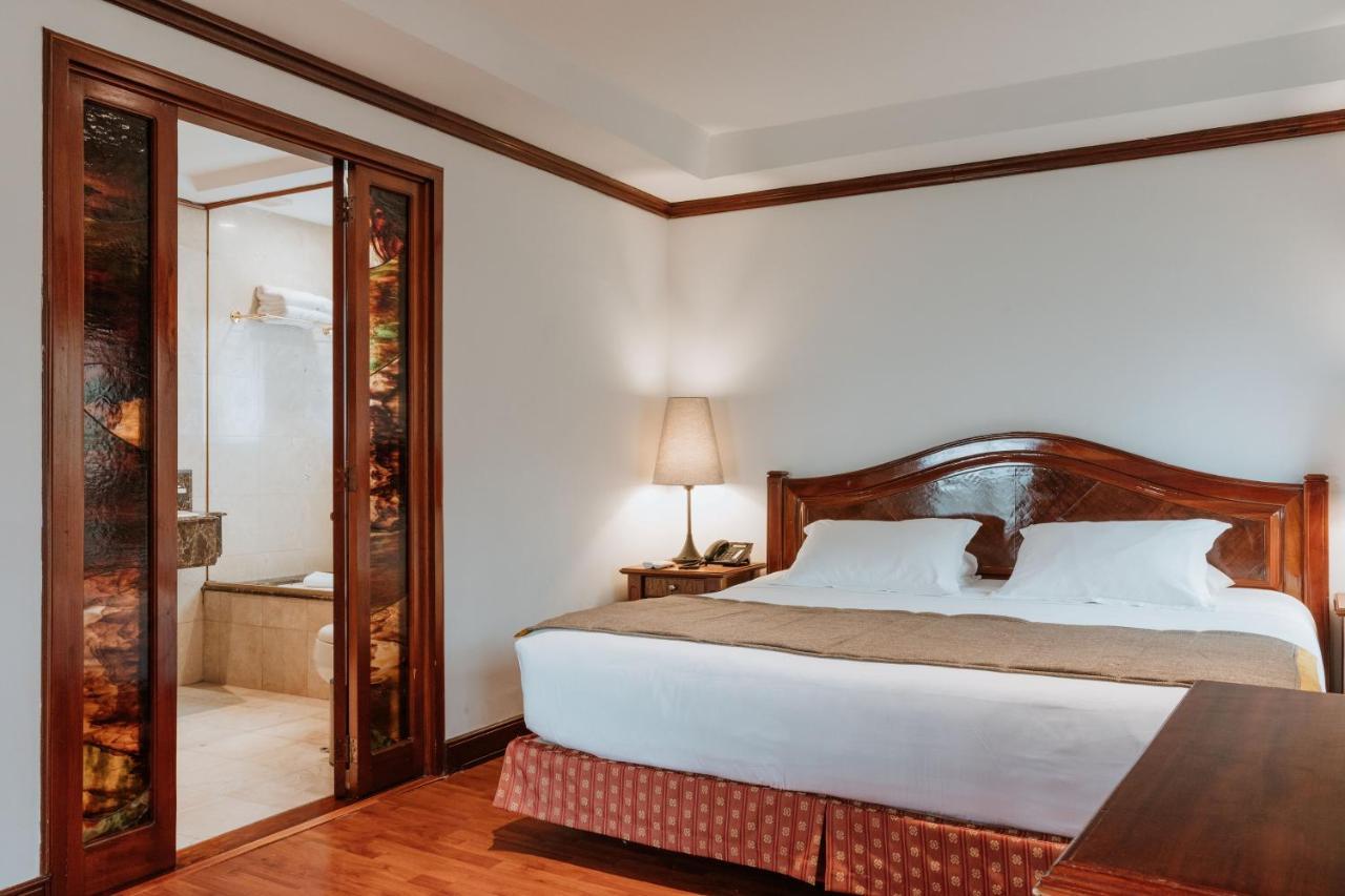 Hotel Park10 Medellin Luaran gambar A bedroom at the hotel